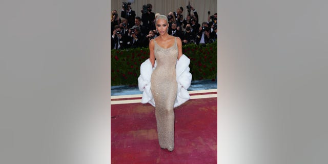 Kim Kardashian wore Marilyn Monroe's sheer, sequined gown to the 2022 Met Gala.