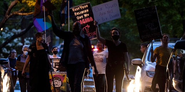 Pro-choice advocates protest outside the home of Supreme Court Justice Brett Kavanaugh on May 11, 2022, in Chevy Chase, Maryland.