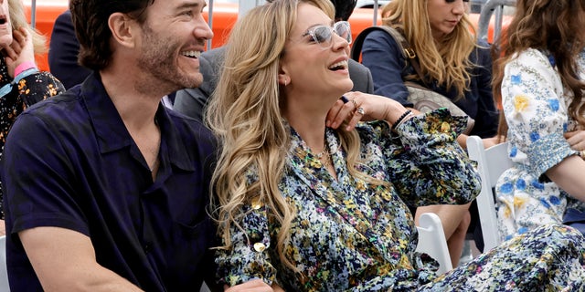 Tom Pelphrey and Kaley Cuoco attend Greg Berlanti's Hollywood Walk of Fame ceremony.