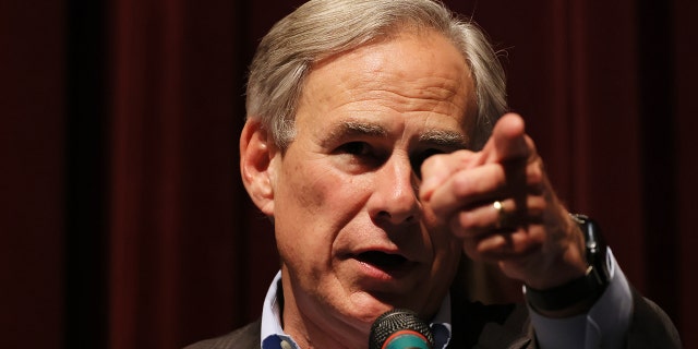 Texas Gov. Abbott lashes out after 46 migrants found dead in tractor-trailer: 'These deaths are on Biden' 2 Gov. Greg Abbott points to a reporter during a press conference.