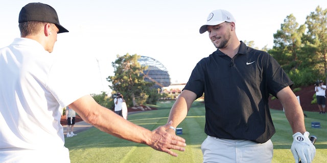 Tom Brady and Josh Allen react during "The Match" on June 1, 2022, in Las Vegas.