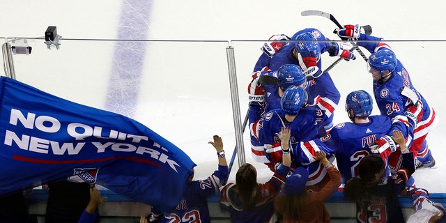 Filip Chytil (72) of the New York Rangers celebrates with his teammates after scoring his second goal on the Tampa Bay Lightning during the second period in Game 1 of the Eastern Conference finals of the 2022 Stanley Cup playoffs at Madison Square Garden June 1, 2022 , in New York City. 