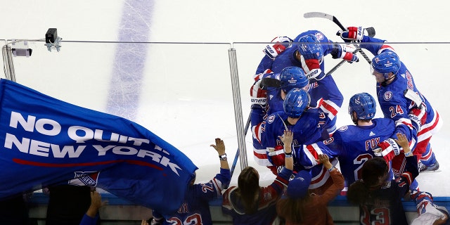 New York Rangers' Filip Chytil (72) celebrates with teammates after scoring his second goal against the Tampa Bay Lightning during the second period in Game 1 of the 2022 Stanley Cup Playoff Eastern Conference Finals at Madison Square Garden on June 1, 2022, in New York. 