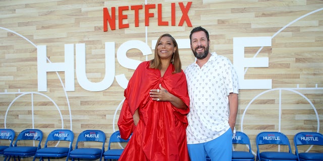 Queen Latifah co-stars in Netflix's "Hustle" alongside Adam Sandler. The two attend the Los Angeles premiere in early June.