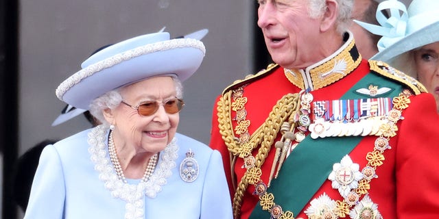 Queen Elizabeth II and Prince Charles, Prince of Wales, on the balcony of Buckingham Palace during Trooping The Color June 2, 2022, in London.