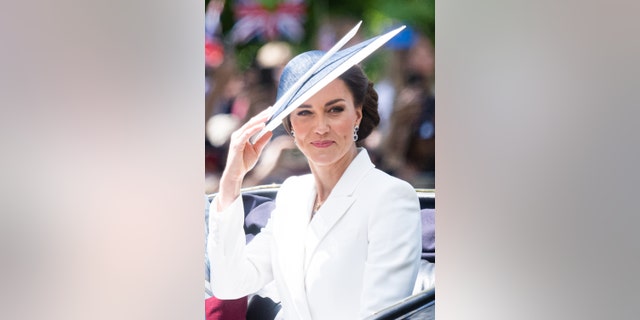 Kate Middleton travels by carriage at Trooping the Colour in London, England.