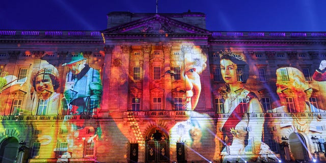 Projections displayed on the front of Buckingham Palace during The Lighting Of The Principal Beacon at Buckingham Palace on June 02, 2022 in London, England. 