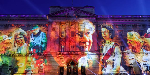 Projections displayed on the front of Buckingham Palace during The Lighting Of The Principal Beacon at Buckingham Palace on June 02, 2022 in London, England.