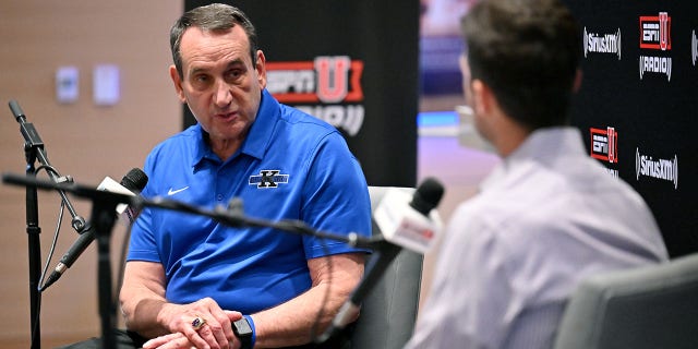 Mike Krzyzewski, retired coach of the Duke Blue Devils, tapes an episode of his SiriusXM show with host Chris Spatola during a SiriusXM Town Hall With Coach K event at Cameron Indoor Stadium June 2, 2022, in Durham, N.C.