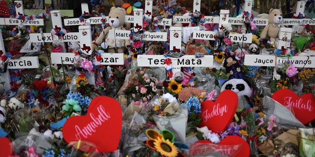 Wooden crosses are placed at a memorial dedicated to the victims of the mass shooting at Robb Elementary School on June 3, 2022, in Uvalde, Texas.