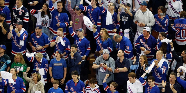 Fans cheer during the first period in Game 2 of the Eastern Conference finals of the 2022 Stanley Cup Playoffs between the Tampa Bay Lightning and the New York Rangers at Madison Square Garden June 3, 2022, in New York City. 