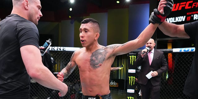 Jeff Molina reacts after his victory over Zhalgas Zhumagulov of Kazakhstan in a flyweight fight during the UFC Fight Night event at UFC APEX on June 4, 2022, in Las Vegas. 