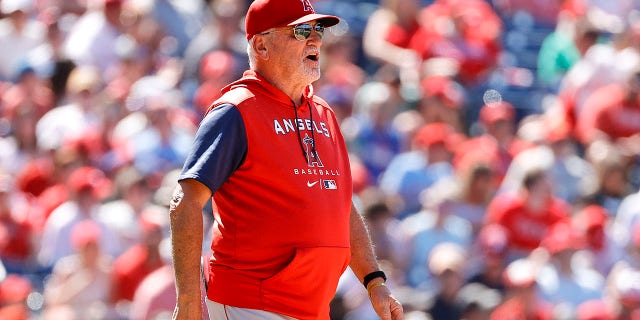 Joe Maddon #70 of the Los Angeles Angels reacts during the fifth inning against the Philadelphia Phillies at Citizens Bank Park on June 05, 2022, in Philadelphia, Pennsylvania.
