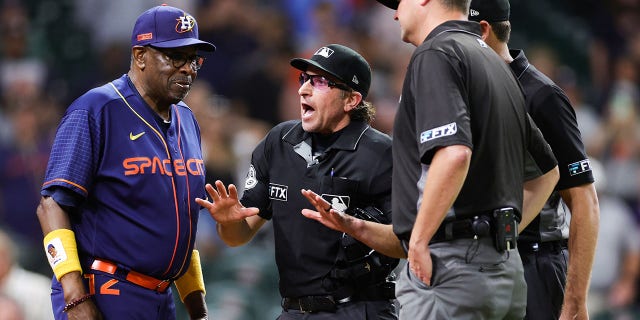 Dusty Baker Jr. of the Astros argues with umpire Chris Guccione at Minute Maid Park on June 6, 2022, in Houston, Texas.