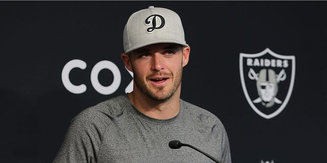 Las Vegas Raiders quarterback Derek Carr speaks during a news conference after the first day of the mandatory minicamp on June 7, 2022 in Henderson, Nevada.
