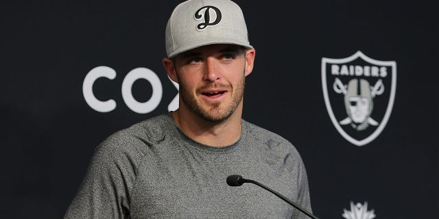 Las Vegas Raiders quarterback Derek Carr speaks during a news conference after the first day of the mandatory minicamp on June 7, 2022 in Henderson, Nevada.