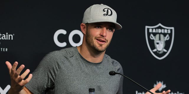 Quarterback Derek Carr #4 of the Las Vegas Raiders speaks during a news conference after the first day of mandatory minicamp at the Las Vegas Raiders Headquarters/Intermountain Healthcare Performance Center on June 07, 2022 in Henderson, Nevada. 