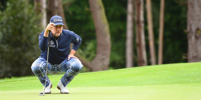 Ian Poulter of Majestics GC puts a putt on the second green during the first day of the LIV Golf Invitational - London at The Centurion Club on June 09, 2022 in St Albans, England. 