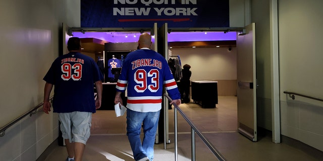 Fans arrive before Game 5 of the Eastern Conference Finals of the 2022 Stanley Cup Playoff between the Tampa Bay Lightning and New York Rangers at Madison Square Garden on June 9, 2022 in New York City. 