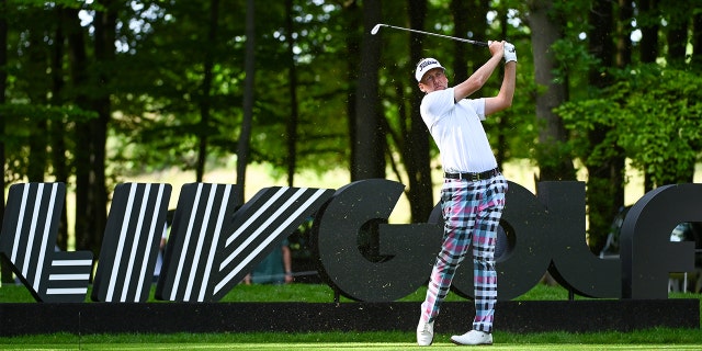 Majestics GC's Ian Poulter tees on the fifth hole during the second day of the LIV Golf Invitational - London at The Centurion Club on June 10, 2022 in St Albans, England. 