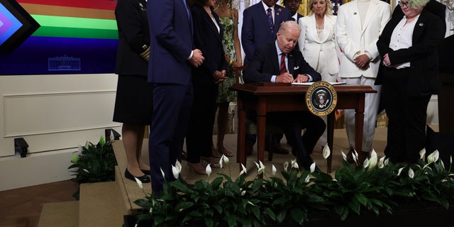 WASHINGTON, DC: President Joe Biden signs an executive order on advancing equality for LGBTQI+ individuals. 