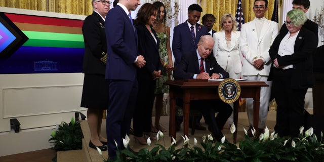WASHINGTON, DC: President Joe Biden signs an executive order on advancing equality for LGBTQI+ individuals.