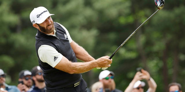 Dustin Johnson of the United States plays his shot from the third tee during the third round of the 122nd U.S. Open Championship at The Country Club on June 18, 2022 in Brookline, Massachusetts.