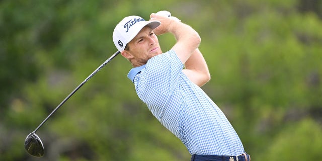 Will Zalatoris plays his shot from the eighth tee during the third round of the 122nd U.S. Open Championship at The Country Club in Brookline, Massachusetts, on June 18, 2022.