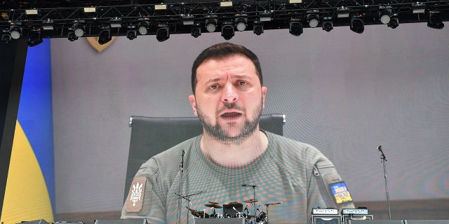 Volodymyr Zelenskyy President of Ukraine, records a message for the people of Glastonbury during day three of Glastonbury Festival at Worthy Farm, Pilton on June 24, 2022 in Glastonbury, England.