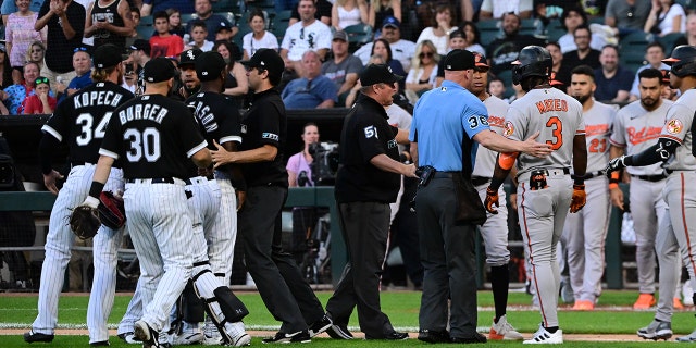 The Chicago White Sox and Baltimore Orioles cleared their benches in the second inning after Jorge Mateo (3) of the Orioles was hit by a pitch from Michael Kopech (34) of the White Sox at Guaranteed Rate Field June 24, 2022, in Chicago. 