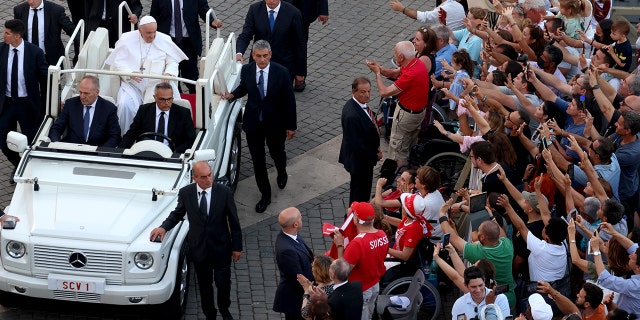 Pope Francis waves to the faithful as he leaves St. Peter's Square at the end of the 10th World Meeting of Families closing Mass on June 25, 2022 in Vatican City, Vatican. (Photo by Franco Origlia/Getty Images)