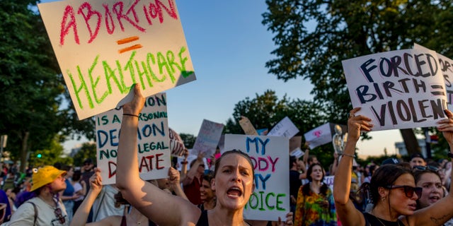 Protesters gather outside the U.S. Supreme Court on June 25, 2022, in Washington in the wake of the decision overturning Roe v. Wade.