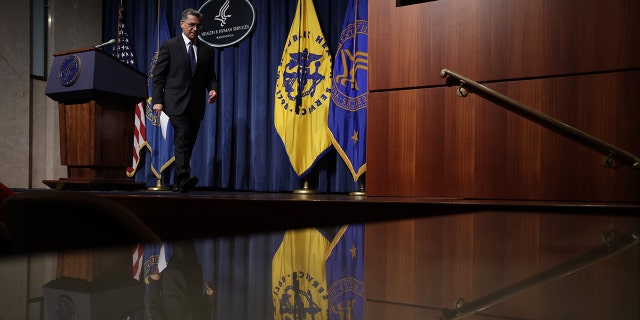 Becerra walks from stage