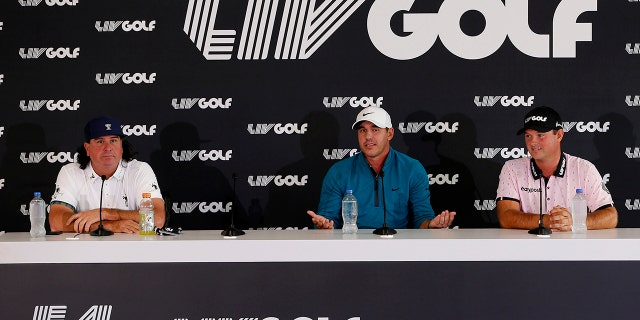 From left: Pat Perez, Brooks Koepka and Patrick Reed speak to the media prior to the LIV Golf Invitational - Portland at Pumpkin Ridge Golf Club in North Plains, Oregon, on June 28, 2022.