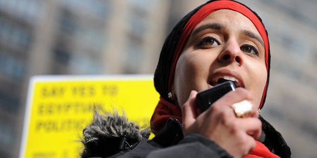 Rana Abdelhamid, a youth activist with Amnesty International, speaks at a rally held by the group on Feb. 12, 2011, in New York.