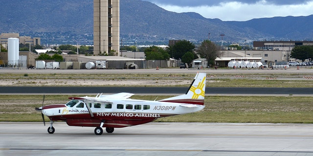 ALBUQUERQUE, NM - SEPTEMBER 22, 2014: A Cessna Caravan propeller airplane operated by New Mexico Airlines taxis to the runway at Albuquerque International Sunport in New Mexico. (Photo by Robert Alexander/Getty Images)