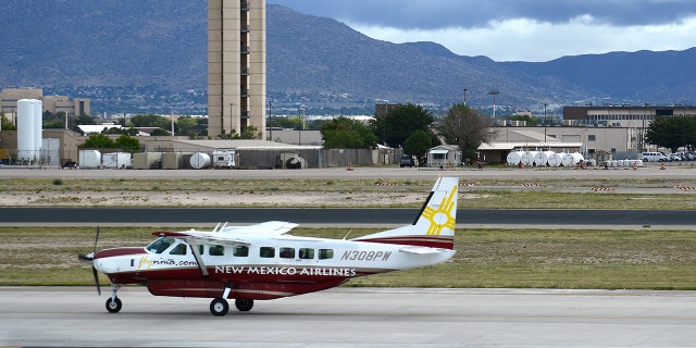 ALBUQUERQUE, NM - SEPTEMBER 22, 2014: A Cessna Caravan propeller airplane operated by New Mexico Airlines taxis to the runway at Albuquerque International Sunport in New Mexico. (Photo by Robert Alexander/Getty Images)