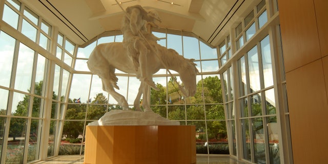 The original "The End of the Trail" by sculptor James Earl Fraser at the National Cowboy and Western Heritage Museum in Oklahoma City. The iconic 18-foot-tall monumental sculpture depicts a weary Native American warrior on horseback as he reaches the Pacific Ocean.