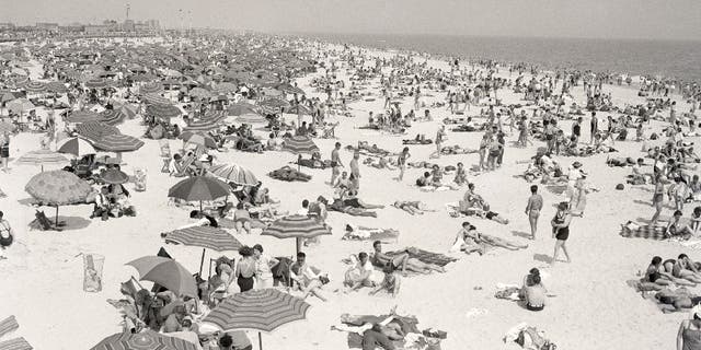 Hot temperatures brought out record crowds to Jones Beach, Long Island, during the 4th, circa 1936.