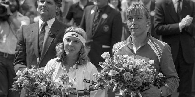 Americans Andrea Jaeger and Martina Navratilova hold bouquets after their Women's Singles Final at Wimbledon, London. Navratilova (R) won the title in straight sets: 6-0, 6-3.