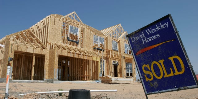 LEAGUE CITY, TX - JUNE 16: A sold sign sits near a home site in the Magnolia Creek subdivision June 16, 2005 in League City, Texas. The U.S. Commerce Department announced on June 16 that construction of new homes rose 0.2 percent in May as the housing market, fueled by low mortgage rates, continued a boom. (Photo by Dave Einsel/Getty Images)