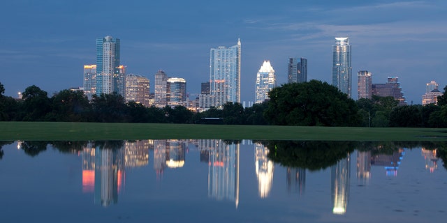 The Austin skyline is reflected in downtown's Zilker Park. 