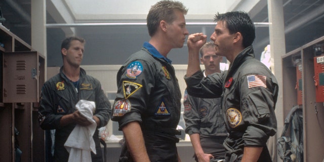 Val Kilmer and Tom Cruise on the set of "Top Gun" directed by Tony Scott. 