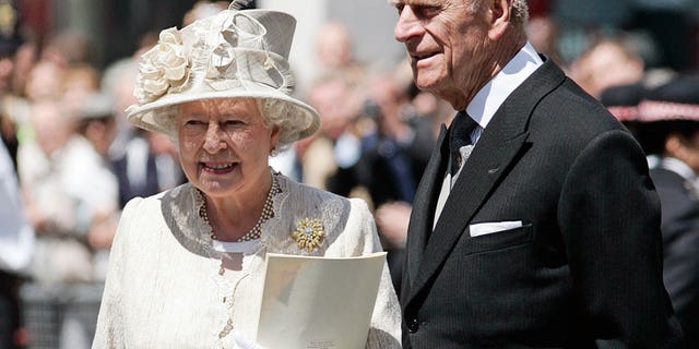 Queen Elizabeth and Prince Philip arrive at St Paul's Cathedral for a service of thanksgiving held in honor of the Queen's 80th birthday.