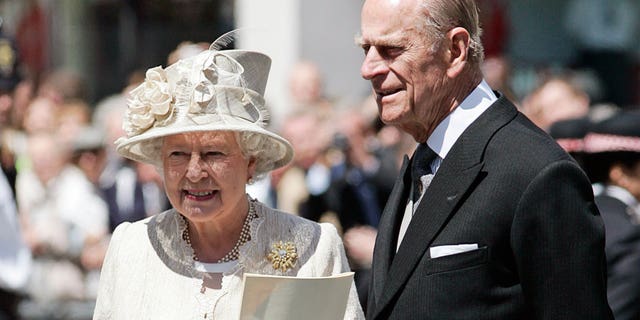 Queen Elizabeth and Prince Philip arrive at St Paul's Cathedral for a service of thanksgiving held in honor of the Queen's 80th birthday.