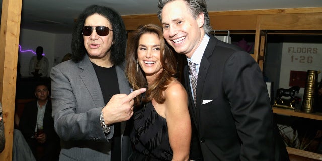 NEW YORK, NY - SEPTEMBER 11: Musician Gene Simmons, Model Cindy Crawford and CEO & Founder of DuJour Media Jason Binn attend the fashion week celebration with DuJour Magazine hosted by Cindy Crawford and Rande Gerber at Mr. Purple on September 11, 2017 in New York City.