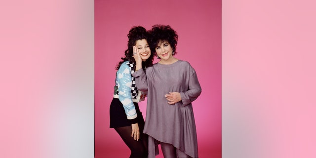 Fran Drescher, left, and Elizabeth Taylor for "The Nanny" episode "Where's the Pearls?" originally broadcast Feb. 26, 1996.