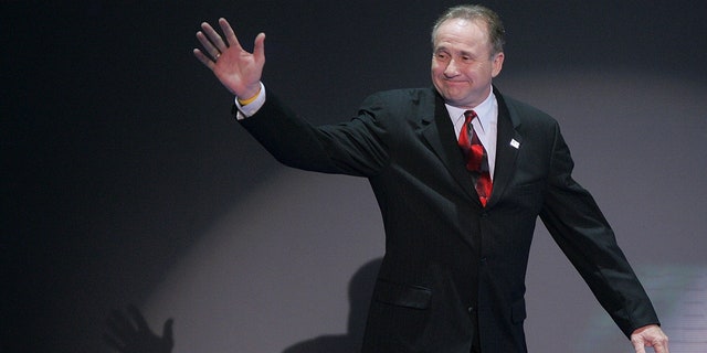 Michael Reagan walks on stage to speak about his father, Ronald Reagan, during the Republican National Convention, Sept. 1, 2004, at Madison Square Garden in New York City.