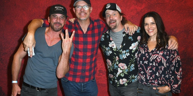 Cast members, from left, Skeet Ulrich, Matthew Lillard, Jamie Kennedy and Neve Campbell from Wes Craven's "Scream" reunite at the Monsterpalooza fan convention on June 5, 2022, in Pasadena, California.