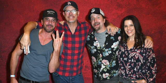 Cast members, from left, Skeet Ulrich, Matthew Lillard, Jamie Kennedy and Neve Campbell from Wes Craven's "Scream" reunite at the Monsterpalooza fan convention on June 5, 2022, in Pasadena, California.